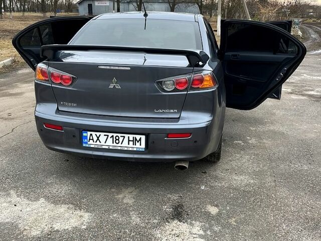 Сірий Міцубісі Lancer, об'ємом двигуна 2 л та пробігом 217 тис. км за 8300 $, фото 9 на Automoto.ua