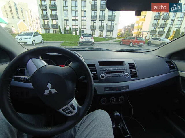 Серый Мицубиси Лансер, объемом двигателя 1.5 л и пробегом 244 тыс. км за 5500 $, фото 1 на Automoto.ua