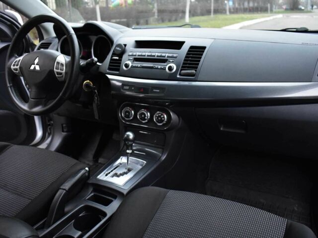 Сірий Міцубісі Lancer, об'ємом двигуна 2 л та пробігом 178 тис. км за 7400 $, фото 13 на Automoto.ua