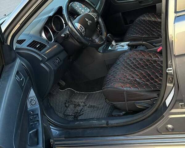 Серый Мицубиси Лансер, объемом двигателя 2 л и пробегом 191 тыс. км за 7900 $, фото 12 на Automoto.ua