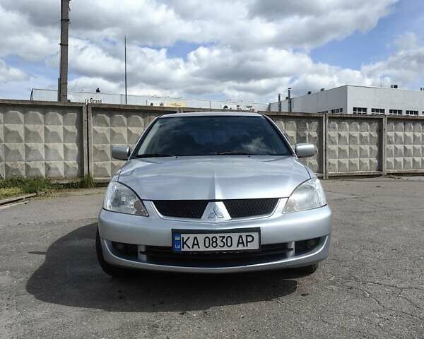 Сірий Міцубісі Lancer, об'ємом двигуна 1.6 л та пробігом 300 тис. км за 5700 $, фото 1 на Automoto.ua