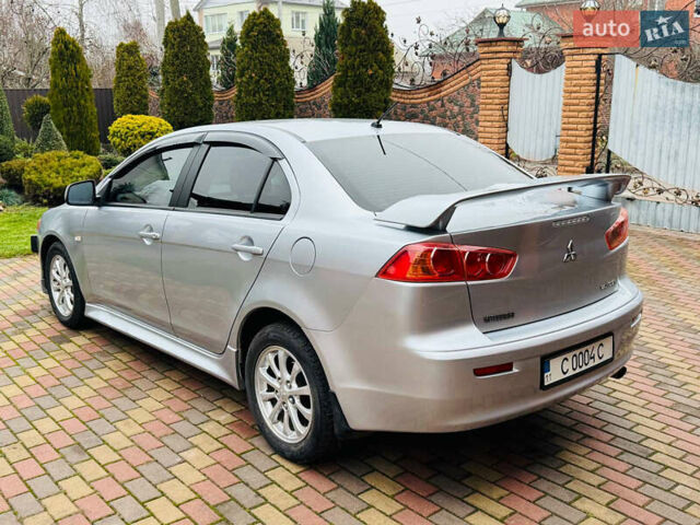 Сірий Міцубісі Lancer, об'ємом двигуна 2 л та пробігом 173 тис. км за 7200 $, фото 13 на Automoto.ua