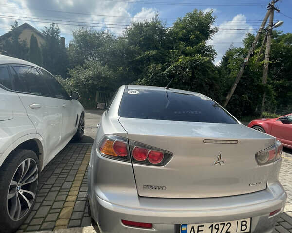 Мицубиси Лансер 2011 в Львове на Automoto.ua Серый Мицубиси Лансер, объемом двигателя 2 л и пробегом 104 тыс. км за 10500 $, фото 18 на Automoto.ua