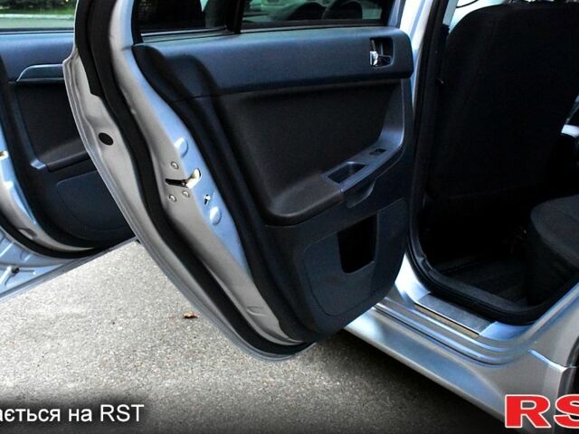 Серый Мицубиси Лансер, объемом двигателя 2 л и пробегом 178 тыс. км за 7400 $, фото 9 на Automoto.ua