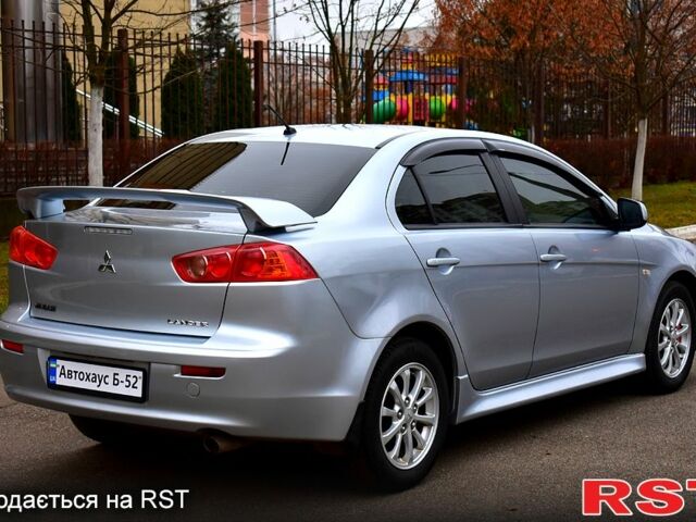 Серый Мицубиси Лансер, объемом двигателя 2 л и пробегом 178 тыс. км за 7400 $, фото 4 на Automoto.ua