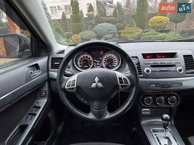 Сірий Міцубісі Lancer, об'ємом двигуна 2 л та пробігом 173 тис. км за 7200 $, фото 28 на Automoto.ua