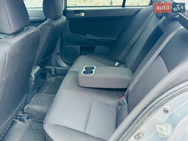 Сірий Міцубісі Lancer, об'ємом двигуна 2 л та пробігом 173 тис. км за 7200 $, фото 31 на Automoto.ua