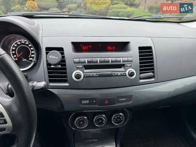 Сірий Міцубісі Lancer, об'ємом двигуна 2 л та пробігом 173 тис. км за 7200 $, фото 23 на Automoto.ua