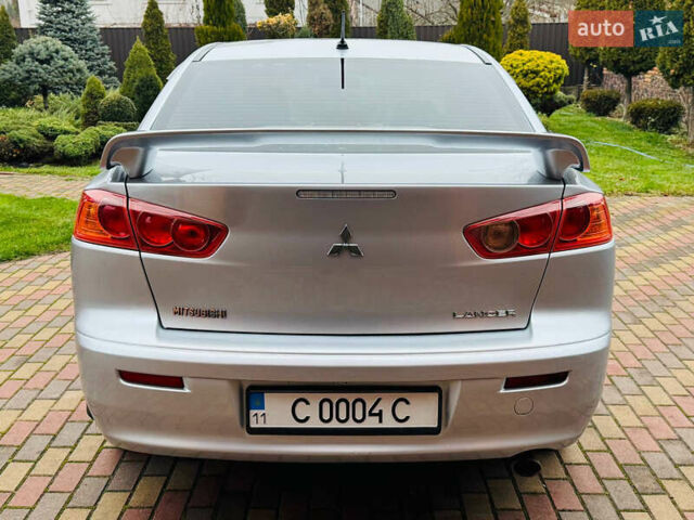 Сірий Міцубісі Lancer, об'ємом двигуна 2 л та пробігом 173 тис. км за 7200 $, фото 11 на Automoto.ua