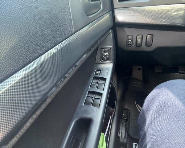 Мицубиси Лансер 2011 в Львове на Automoto.ua Серый Мицубиси Лансер, объемом двигателя 2 л и пробегом 104 тыс. км за 10500 $, фото 57 на Automoto.ua