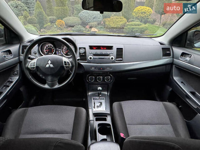 Сірий Міцубісі Lancer, об'ємом двигуна 2 л та пробігом 173 тис. км за 7200 $, фото 29 на Automoto.ua