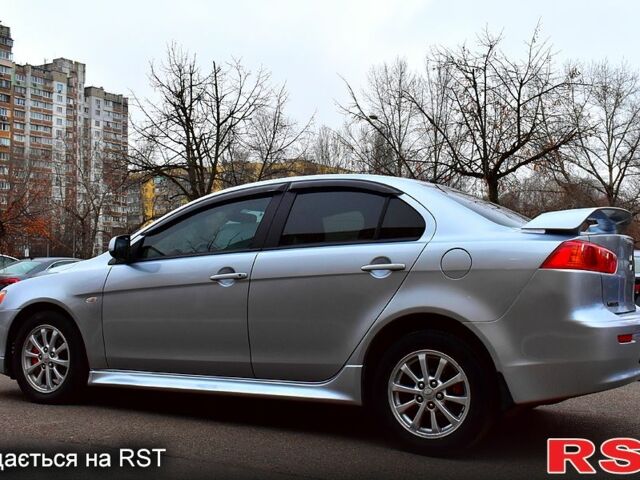 Серый Мицубиси Лансер, объемом двигателя 2 л и пробегом 178 тыс. км за 7400 $, фото 1 на Automoto.ua