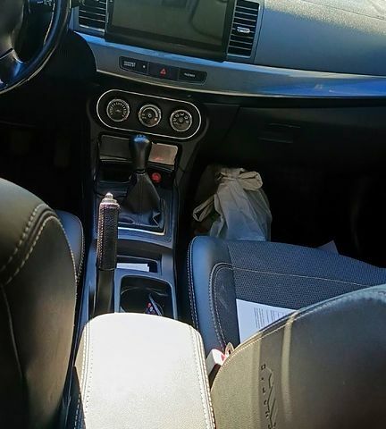 Серый Мицубиси Лансер, объемом двигателя 2 л и пробегом 187 тыс. км за 7500 $, фото 3 на Automoto.ua