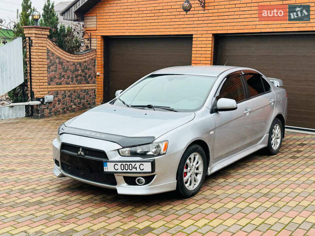 Сірий Міцубісі Lancer, об'ємом двигуна 2 л та пробігом 173 тис. км за 7200 $, фото 14 на Automoto.ua