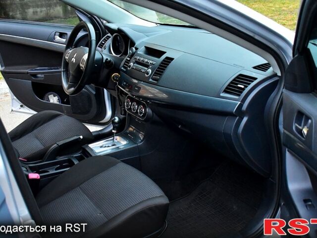 Серый Мицубиси Лансер, объемом двигателя 2 л и пробегом 178 тыс. км за 7400 $, фото 11 на Automoto.ua