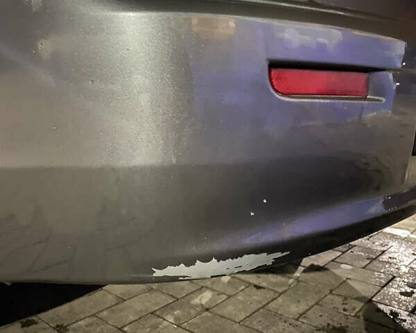 Серый Мицубиси Лансер, объемом двигателя 1.5 л и пробегом 227 тыс. км за 7300 $, фото 16 на Automoto.ua