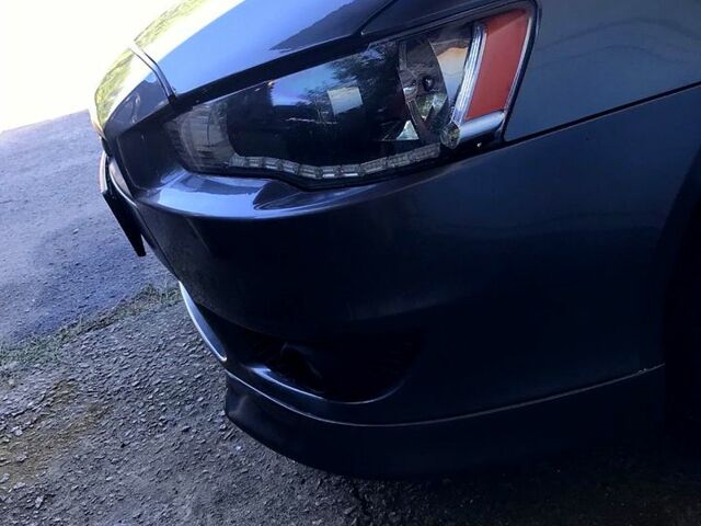 Серый Мицубиси Лансер, объемом двигателя 2 л и пробегом 187 тыс. км за 7500 $, фото 6 на Automoto.ua