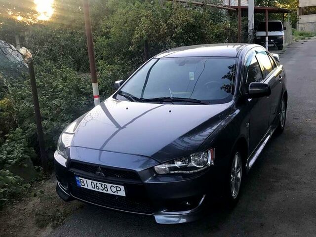 Серый Мицубиси Лансер, объемом двигателя 2 л и пробегом 187 тыс. км за 7500 $, фото 5 на Automoto.ua