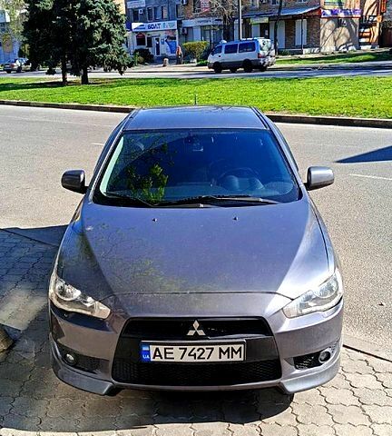 Серый Мицубиси Лансер, объемом двигателя 2 л и пробегом 187 тыс. км за 7500 $, фото 1 на Automoto.ua