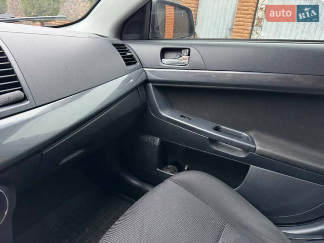 Сірий Міцубісі Lancer, об'ємом двигуна 2 л та пробігом 173 тис. км за 7200 $, фото 30 на Automoto.ua