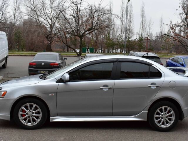 Сірий Міцубісі Lancer, об'ємом двигуна 2 л та пробігом 178 тис. км за 7400 $, фото 8 на Automoto.ua