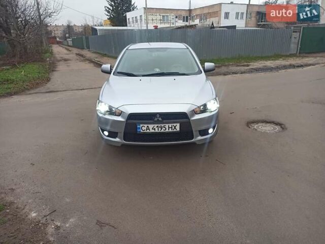 Сірий Міцубісі Lancer, об'ємом двигуна 1.5 л та пробігом 255 тис. км за 7500 $, фото 1 на Automoto.ua