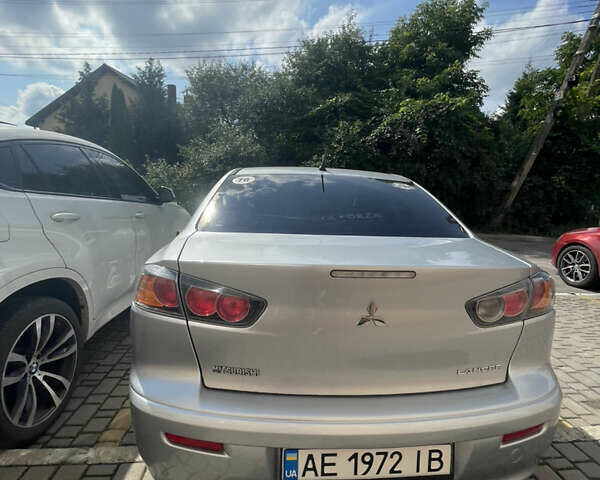 Мицубиси Лансер 2011 в Львове на Automoto.ua Серый Мицубиси Лансер, объемом двигателя 2 л и пробегом 104 тыс. км за 10500 $, фото 17 на Automoto.ua