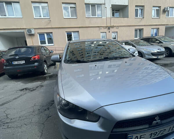 Мицубиси Лансер 2011 в Львове на Automoto.ua Серый Мицубиси Лансер, объемом двигателя 2 л и пробегом 104 тыс. км за 10500 $, фото 34 на Automoto.ua