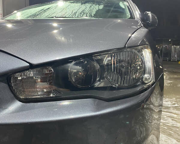 Серый Мицубиси Лансер, объемом двигателя 1.5 л и пробегом 227 тыс. км за 7300 $, фото 5 на Automoto.ua