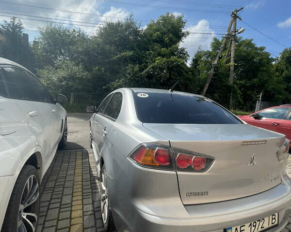 Мицубиси Лансер 2011 в Львове на Automoto.ua Серый Мицубиси Лансер, объемом двигателя 2 л и пробегом 104 тыс. км за 10500 $, фото 19 на Automoto.ua