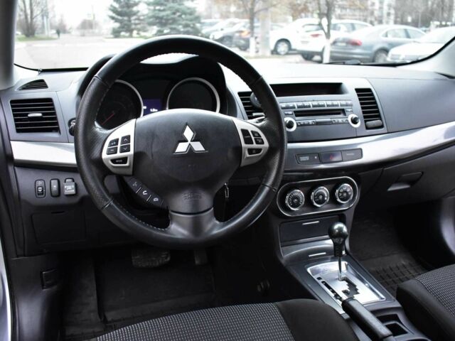 Сірий Міцубісі Lancer, об'ємом двигуна 2 л та пробігом 178 тис. км за 7400 $, фото 19 на Automoto.ua