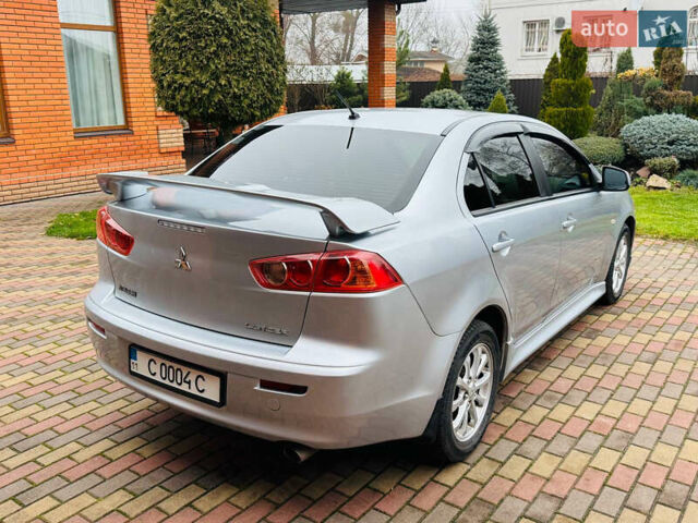 Сірий Міцубісі Lancer, об'ємом двигуна 2 л та пробігом 173 тис. км за 7200 $, фото 12 на Automoto.ua