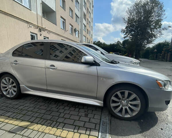 Мицубиси Лансер 2011 в Львове на Automoto.ua Серый Мицубиси Лансер, объемом двигателя 2 л и пробегом 104 тыс. км за 10500 $, фото 6 на Automoto.ua