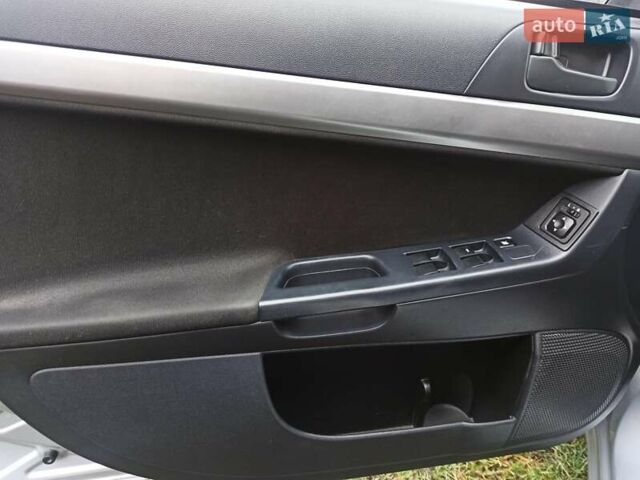 Сірий Міцубісі Lancer, об'ємом двигуна 1.5 л та пробігом 255 тис. км за 7500 $, фото 19 на Automoto.ua