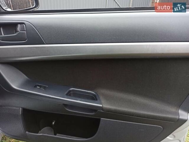 Сірий Міцубісі Lancer, об'ємом двигуна 1.5 л та пробігом 255 тис. км за 7500 $, фото 18 на Automoto.ua