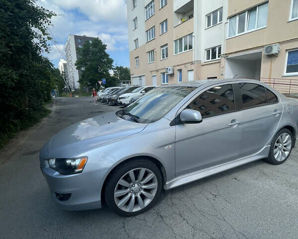 Мицубиси Лансер 2011 в Львове на Automoto.ua Серый Мицубиси Лансер, объемом двигателя 2 л и пробегом 104 тыс. км за 10500 $, фото 28 на Automoto.ua