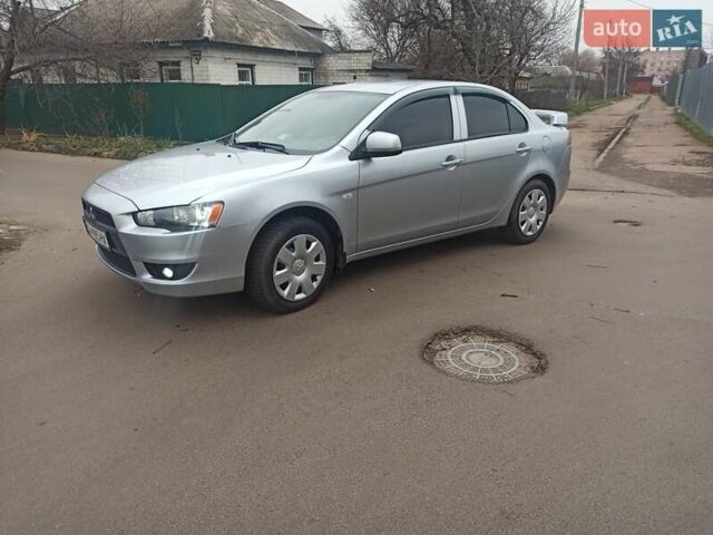 Сірий Міцубісі Lancer, об'ємом двигуна 1.5 л та пробігом 255 тис. км за 7500 $, фото 2 на Automoto.ua