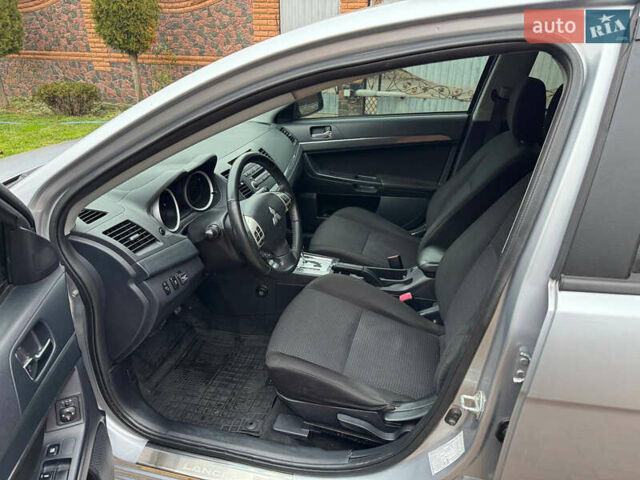 Сірий Міцубісі Lancer, об'ємом двигуна 2 л та пробігом 173 тис. км за 7200 $, фото 16 на Automoto.ua