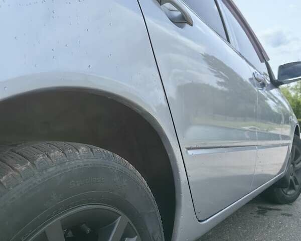 Сірий Міцубісі Lancer, об'ємом двигуна 1.6 л та пробігом 300 тис. км за 5700 $, фото 7 на Automoto.ua