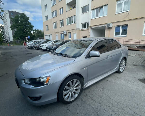 Мицубиси Лансер 2011 в Львове на Automoto.ua Серый Мицубиси Лансер, объемом двигателя 2 л и пробегом 104 тыс. км за 10500 $, фото 29 на Automoto.ua