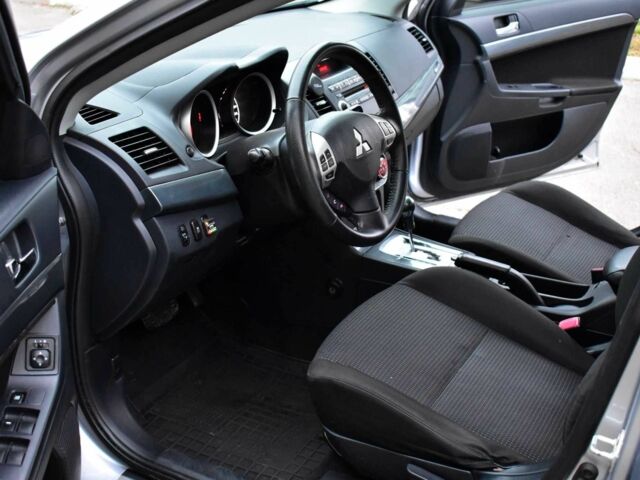 Сірий Міцубісі Lancer, об'ємом двигуна 2 л та пробігом 178 тис. км за 7400 $, фото 11 на Automoto.ua