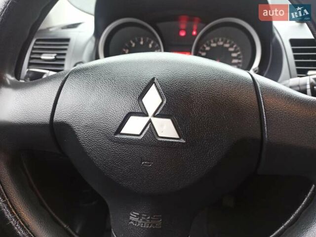 Сірий Міцубісі Lancer, об'ємом двигуна 1.5 л та пробігом 255 тис. км за 7500 $, фото 13 на Automoto.ua