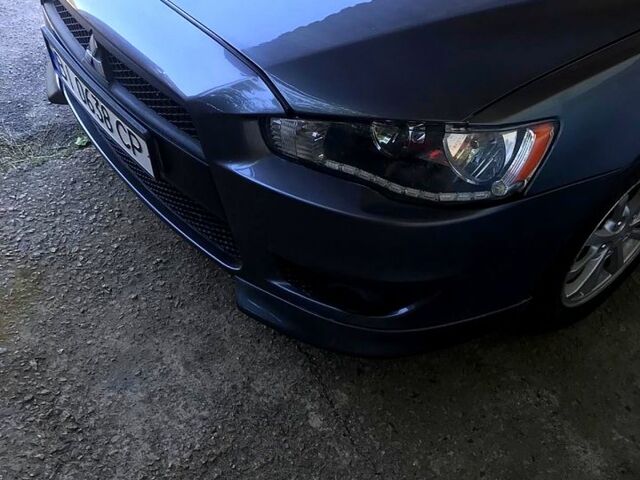 Серый Мицубиси Лансер, объемом двигателя 2 л и пробегом 187 тыс. км за 7500 $, фото 7 на Automoto.ua