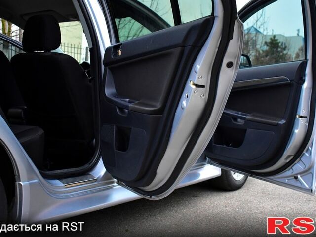 Серый Мицубиси Лансер, объемом двигателя 2 л и пробегом 178 тыс. км за 7400 $, фото 10 на Automoto.ua