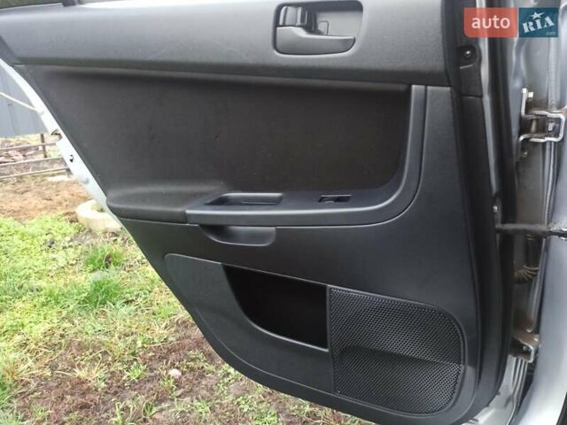 Сірий Міцубісі Lancer, об'ємом двигуна 1.5 л та пробігом 255 тис. км за 7500 $, фото 23 на Automoto.ua