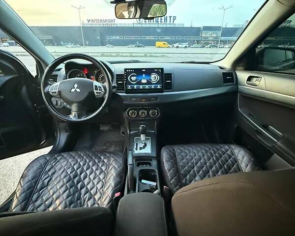 Серый Мицубиси Лансер, объемом двигателя 2 л и пробегом 191 тыс. км за 7900 $, фото 2 на Automoto.ua