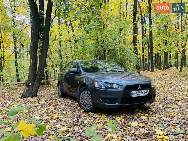 Серый Мицубиси Лансер, объемом двигателя 1.5 л и пробегом 189 тыс. км за 6999 $, фото 1 на Automoto.ua
