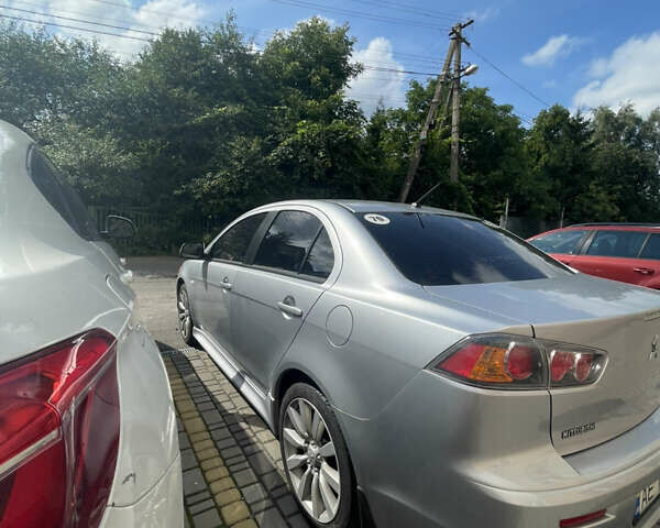 Мицубиси Лансер 2011 в Львове на Automoto.ua Серый Мицубиси Лансер, объемом двигателя 2 л и пробегом 104 тыс. км за 10500 $, фото 21 на Automoto.ua