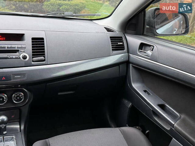 Сірий Міцубісі Lancer, об'ємом двигуна 2 л та пробігом 173 тис. км за 7200 $, фото 19 на Automoto.ua