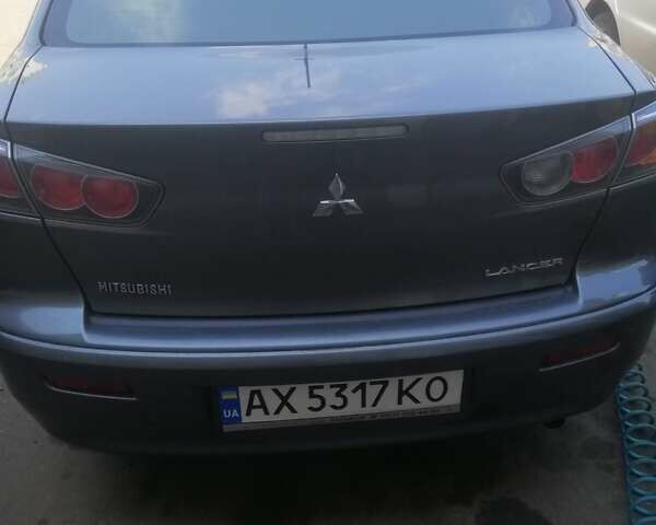 Сірий Міцубісі Lancer, об'ємом двигуна 2 л та пробігом 263 тис. км за 7000 $, фото 1 на Automoto.ua